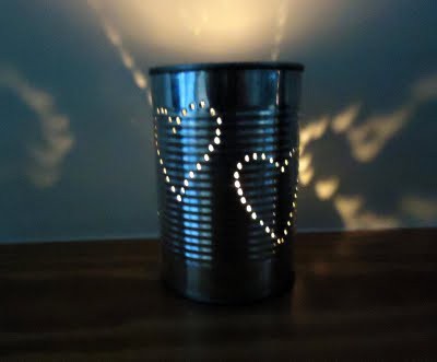Tin can light. From: http://pinterest.com/pin/211808919/ Tin can light. From: http://pinterest.com/pin/211808919/