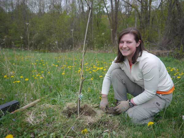 Return of the floodplain forest? The Conservancy's Angela Sirois-Piteo helps plant elm cuttings which may one day return this iconic tree to its rightful place in eastern ecosystems. Photo: Matt Miller/TNC