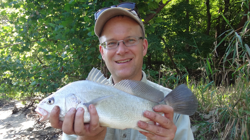 The author with a freshwater drum. Photo © Ben Cantrell