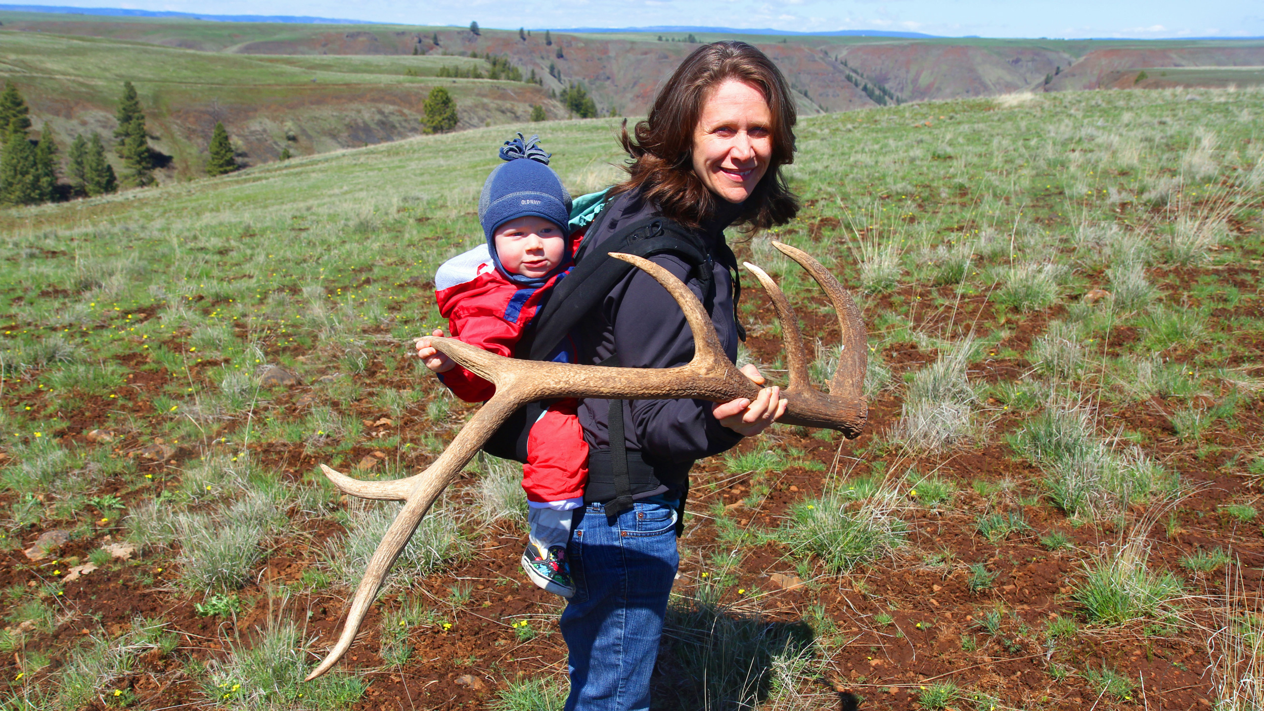 The author's wife and son, Jen and Derek, display their big find. Photo © The Nature Conservancy (Matt Miller)