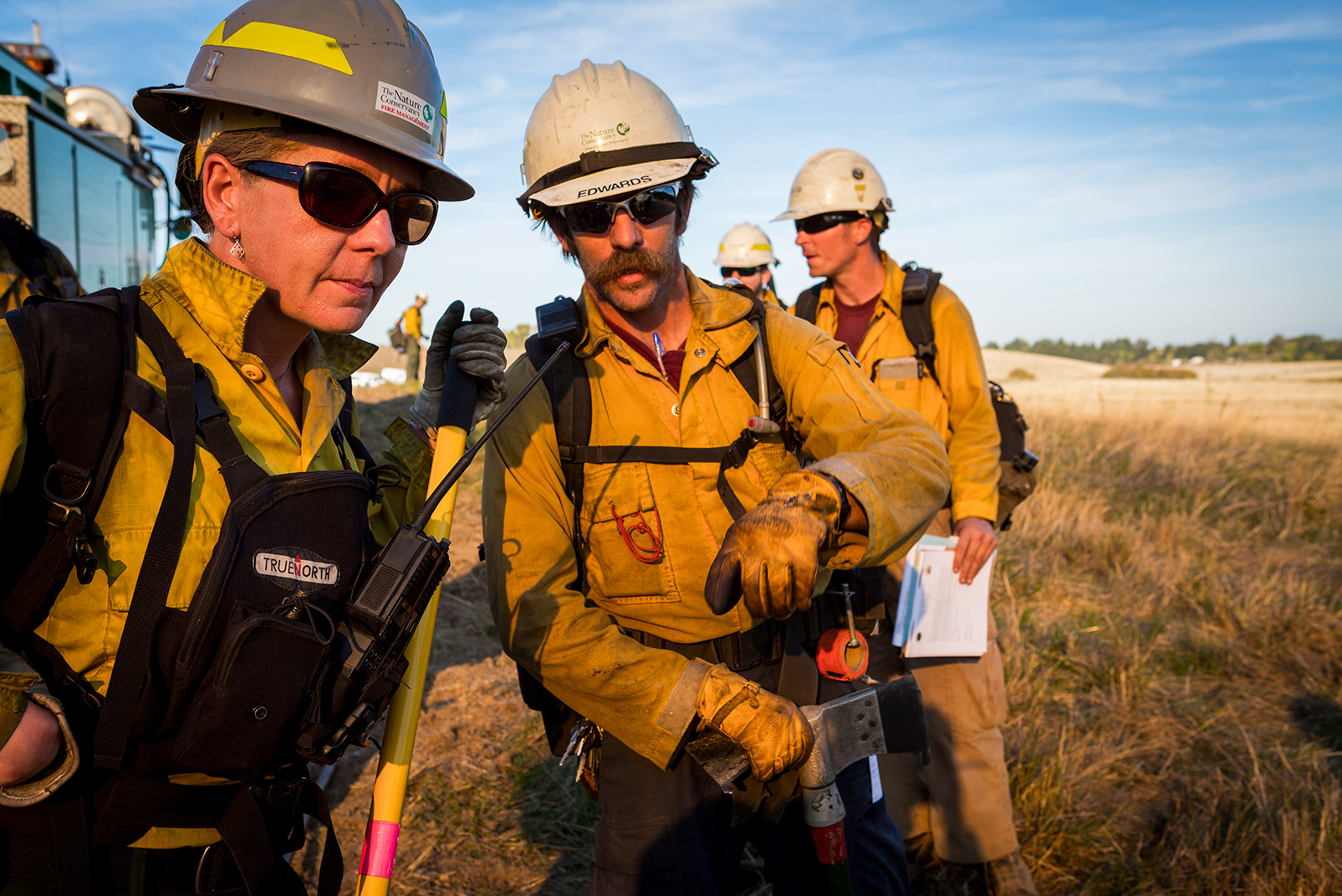 Photographer Jason Houston became a member of the team, getting to know people like Oregon Fire Manger Amanda Stamper (left) and Assistant Module Leader Tom Edwards. The team worked with local branches of groups like the U.S. Fish and Wildlife, the U.S. Forest Service and the Bureau of Land Management. Photo © Jason Houston