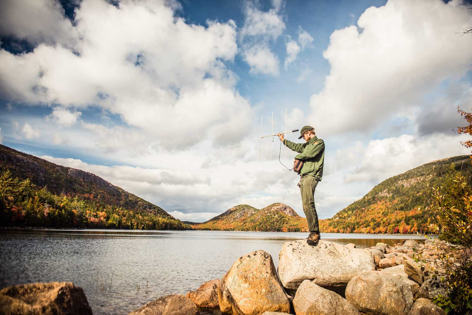 An Acadia park ranger monitors bats at Jordan Pond with a remote transmission system. Acadia was the first park to emerge from private citizens’ land donations after a group of year-round Maine residents and summer vacation-goers contributed land that led to the park’s creation. Photo © Nick Hall