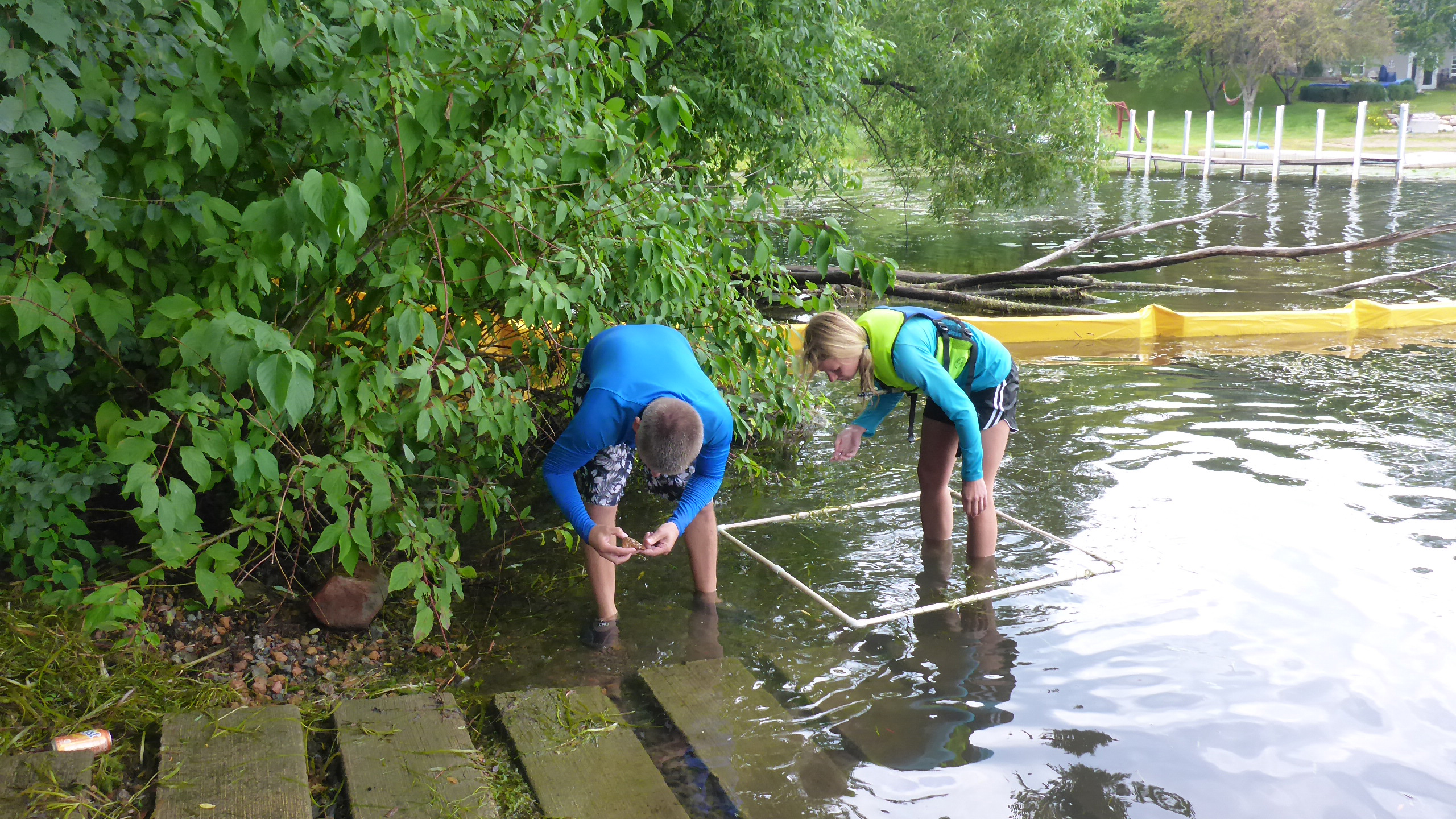 Searching for invasive mussels in Christmas Lake. Photo © Jill Sweet