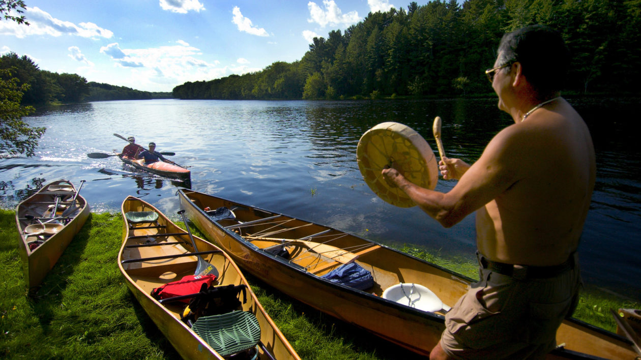 man with canoe