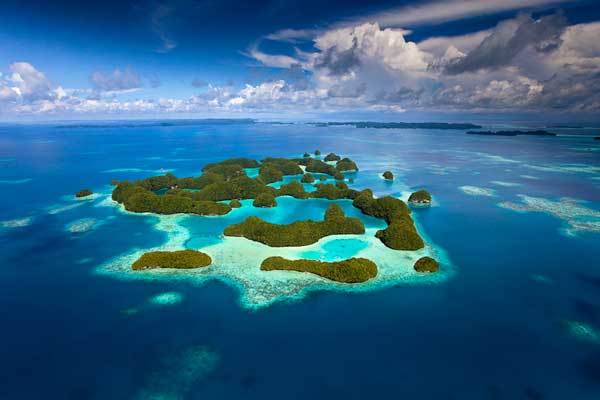 Palau’s Rock Islands seen from the air. The Rock Islands are a top tourist destination for Palau, but the reefs here have been overfished. Credit: Ian Shive. 