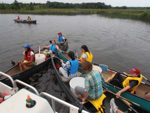 Many students have enthusiastically participated in removing Eurasian watermilfoil at Lulu Lake. They'll also be important in spreading the word. Photo: Jerry Ziegler/TNC