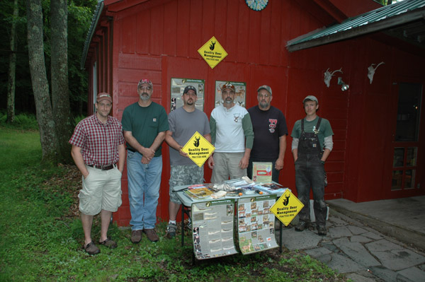 The Conservancy's Mike Eckley (left) meets with members of the Little Elk Lake Hunting Club. Photo: George Gress/TNC