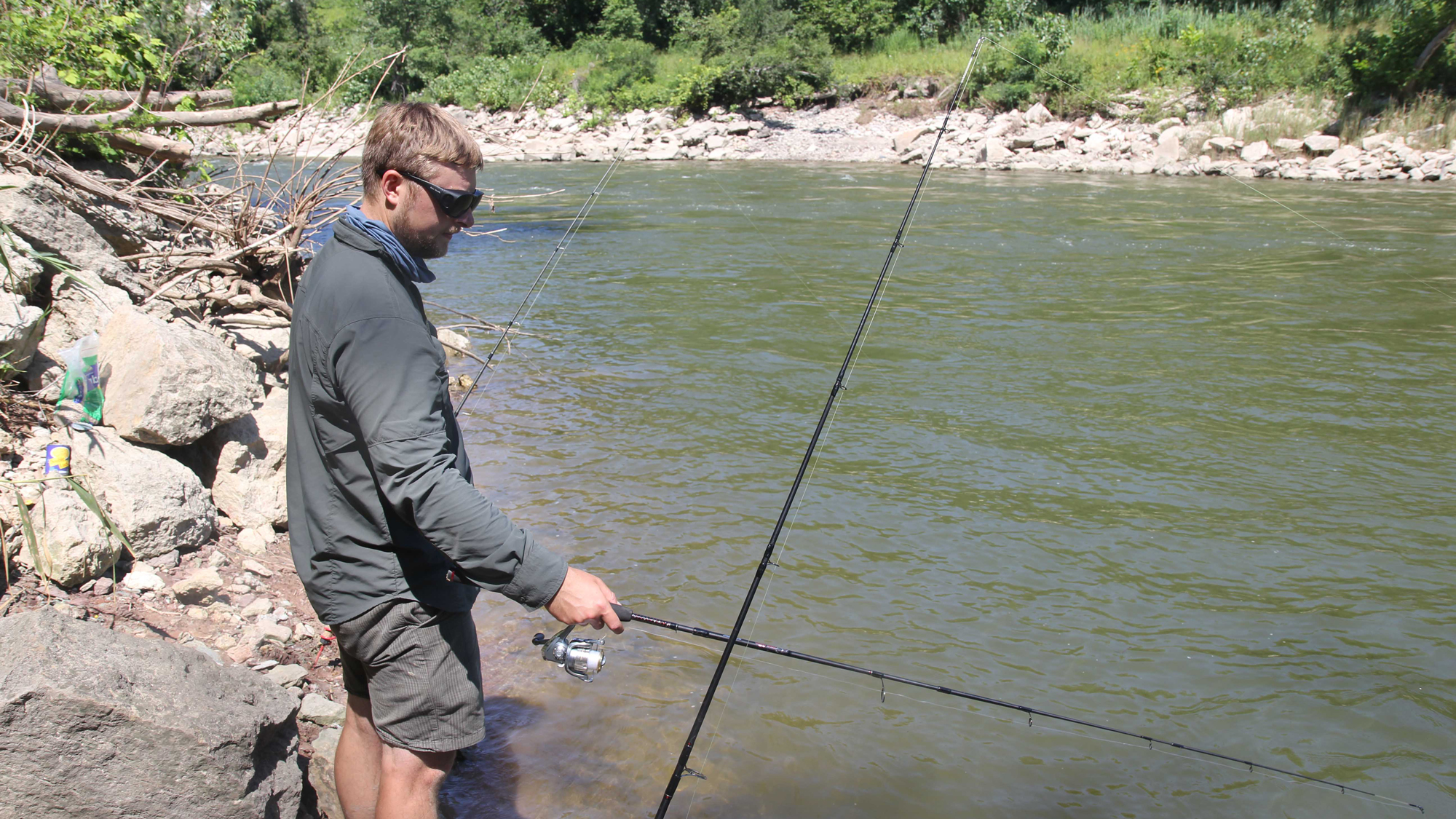 Ben Cantrell works at catching new species for his life list at “Garvana.” Photo © Matt Miller/TNC