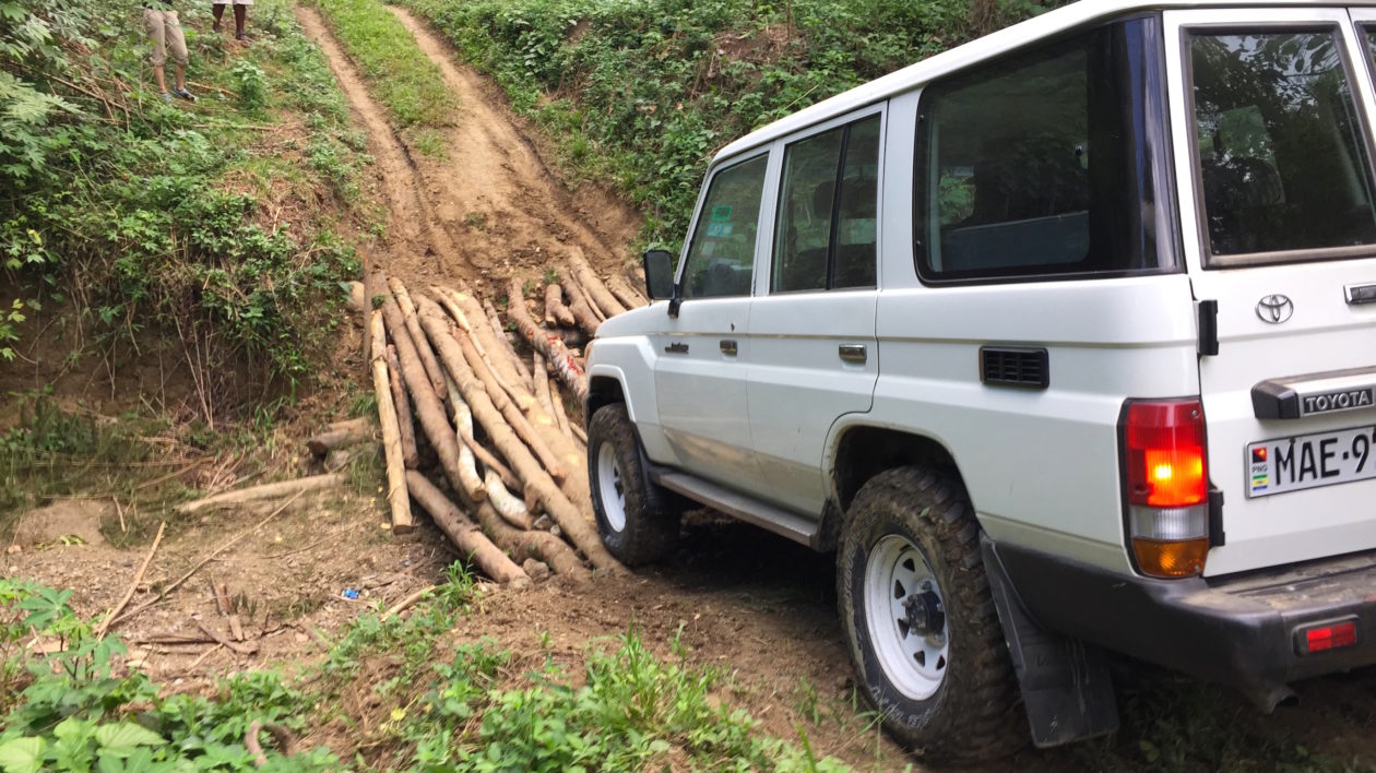 Our PMVs breaking the bridges on the road into the mountains. Photo © Timothy Boucher