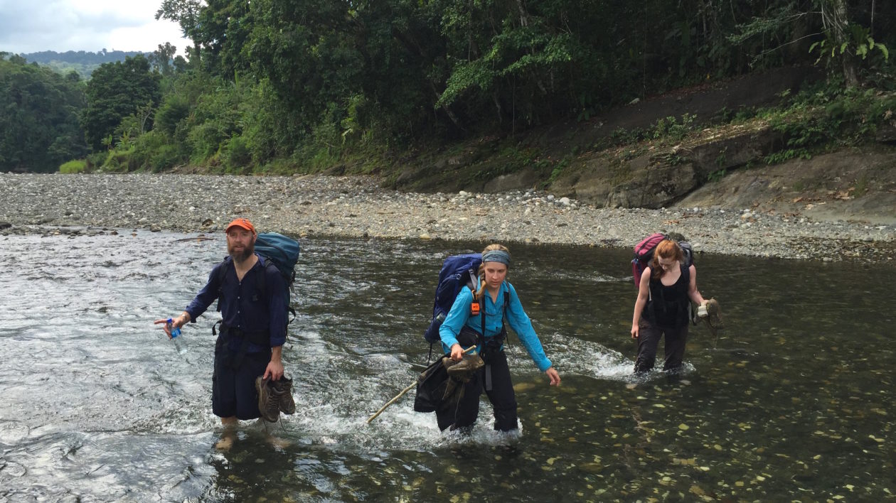 Our first and last attempt to keep our shoes dry. Photo © Timothy Boucher