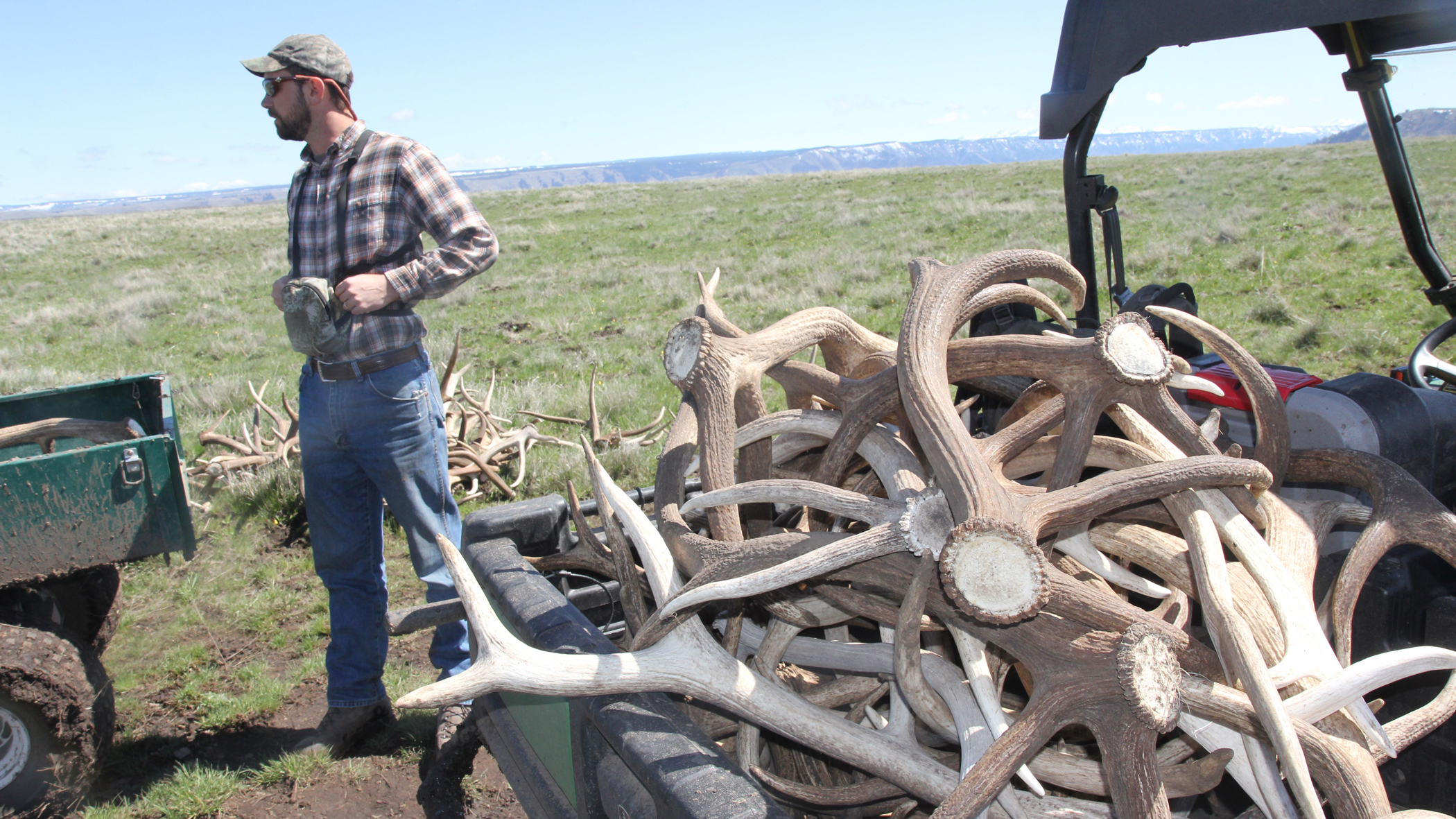 The Conservancy's Justin Jones rounds up some antlers.  Photo © The Nature Conservancy (Matt Miller)