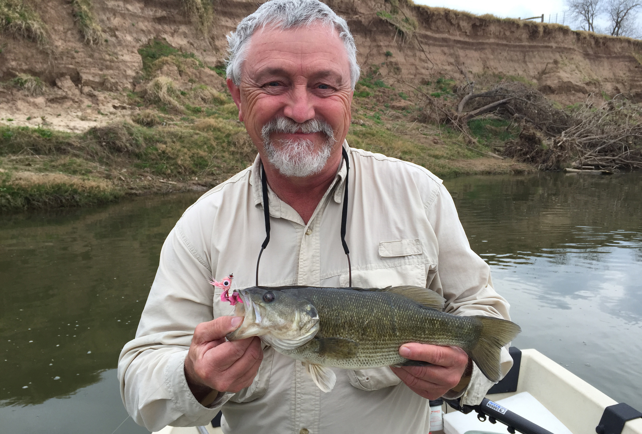 The Conservancy's John Karges with a Guadalupe bass. Photo © The Nature Conservancy (Matt Miller)