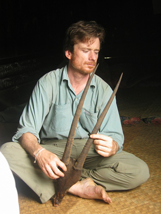 Bill Robichaud with saola horns. Photo © Bill Robichaud / Global Wildlife Conservation / Flickr through a Creative Commons license