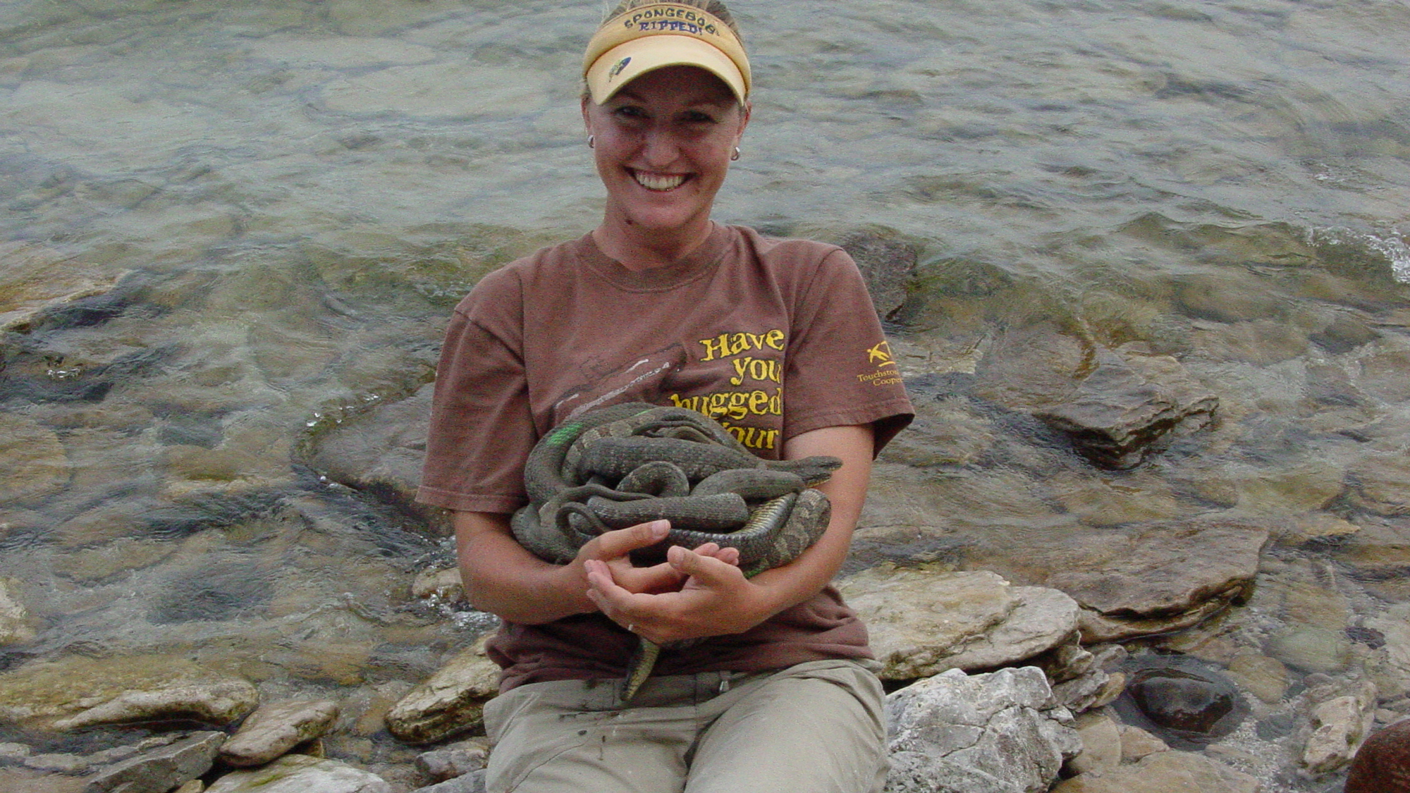 Kristin Stanford embraces her work. Photo © Kent Bekker