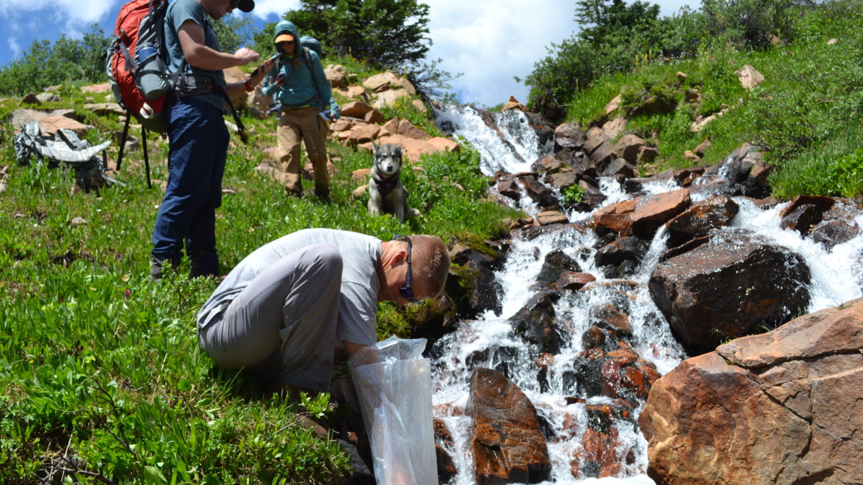 people near a stream