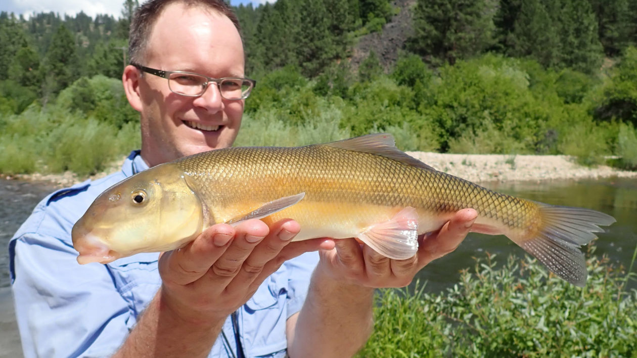 man holding a fish