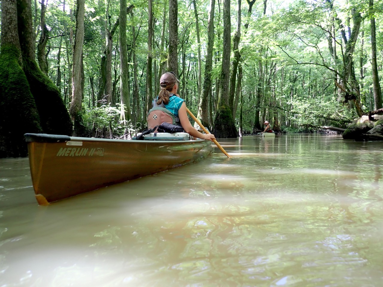women in canoe