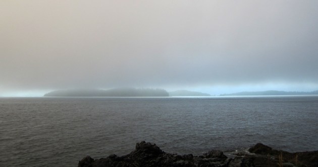 ocean with low grey clouds