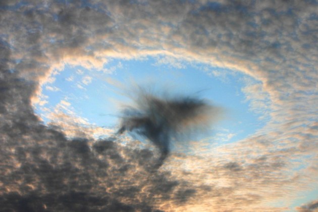large cloud with hole in the middle