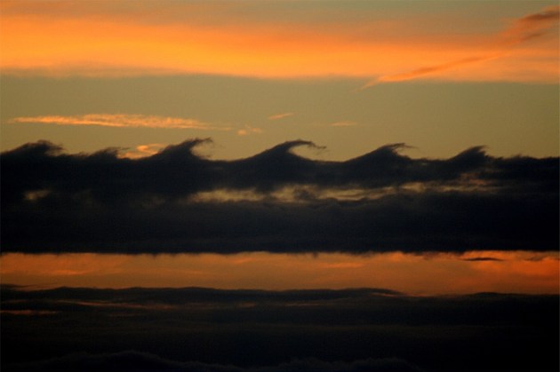 orange sky with wavy clouds