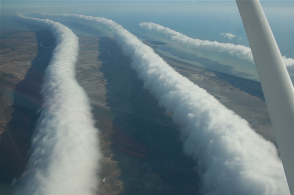 aerial view of long rolled clouds