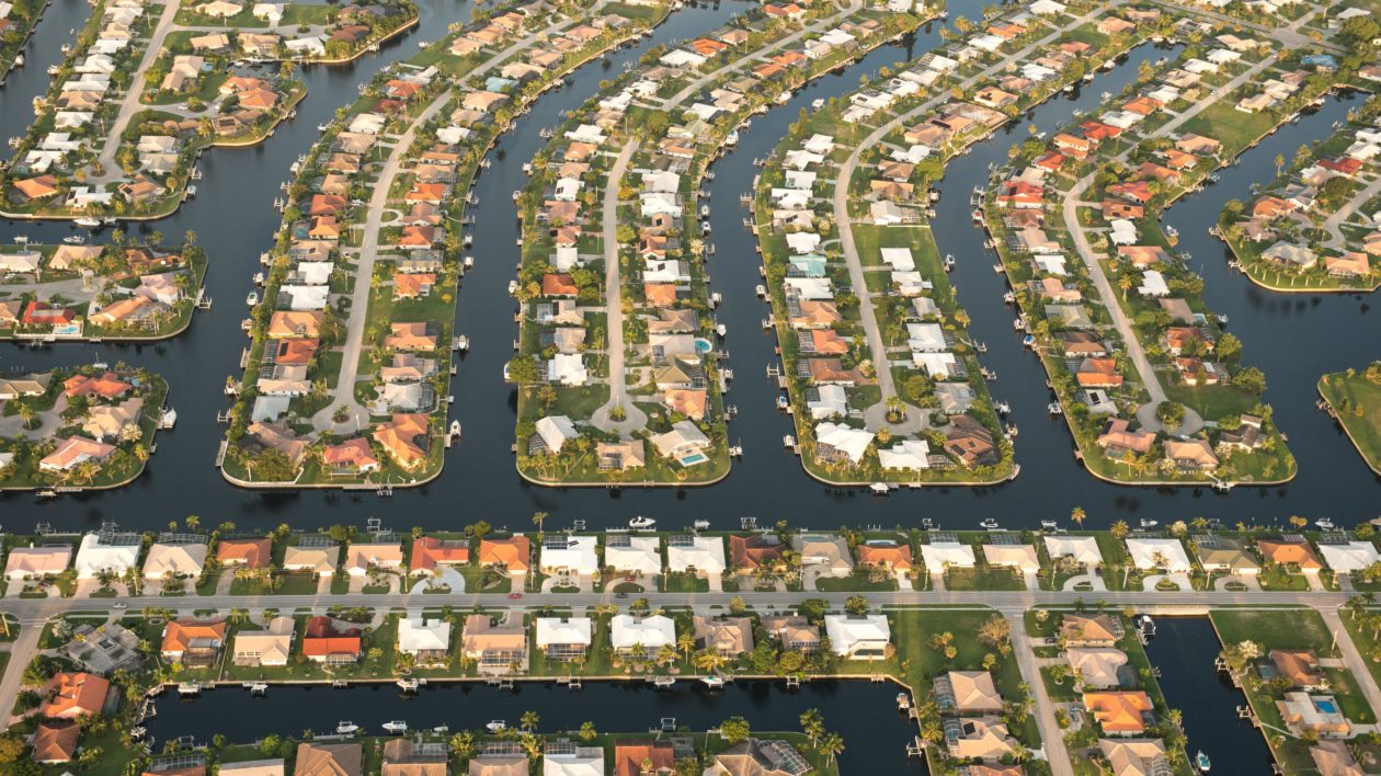 aerial view of housing development near canals