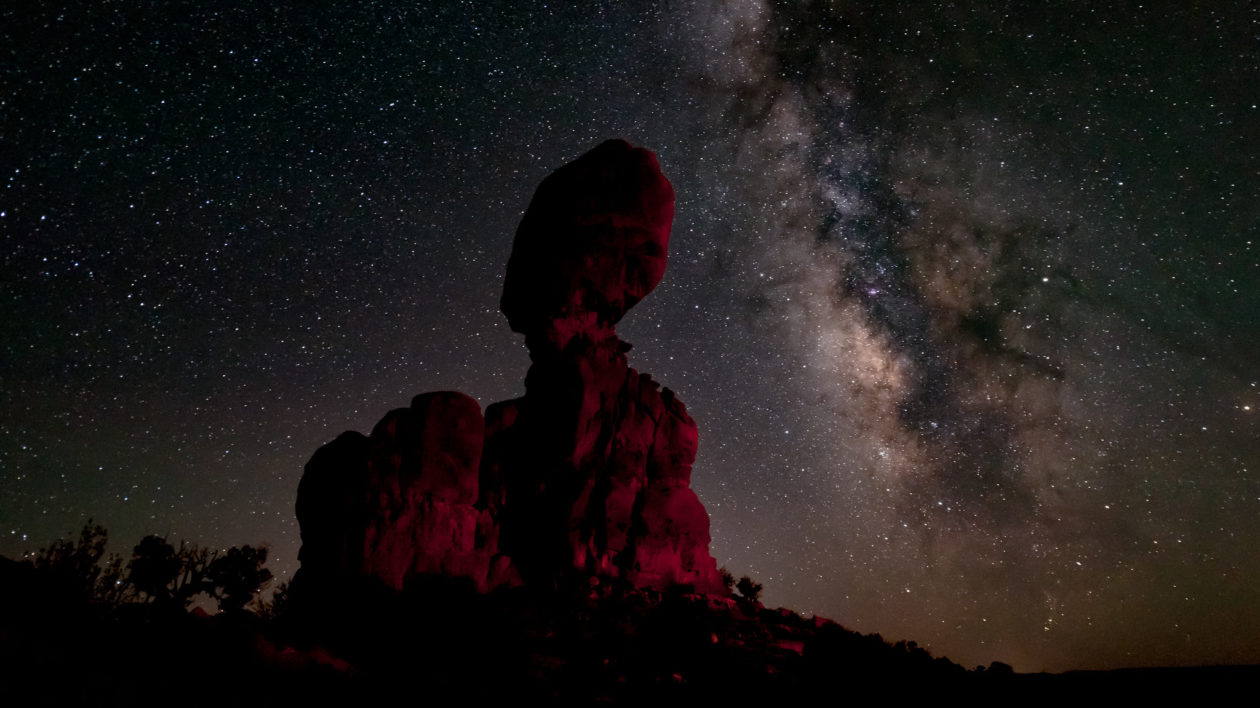 rock formation with night sky behind