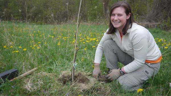 Return of the floodplain forest? The Conservancy's Angela Sirois-Piteo helps plant elm cuttings which may one day return this iconic tree to its rightful place in eastern ecosystems. Photo: Matt Miller/TNC