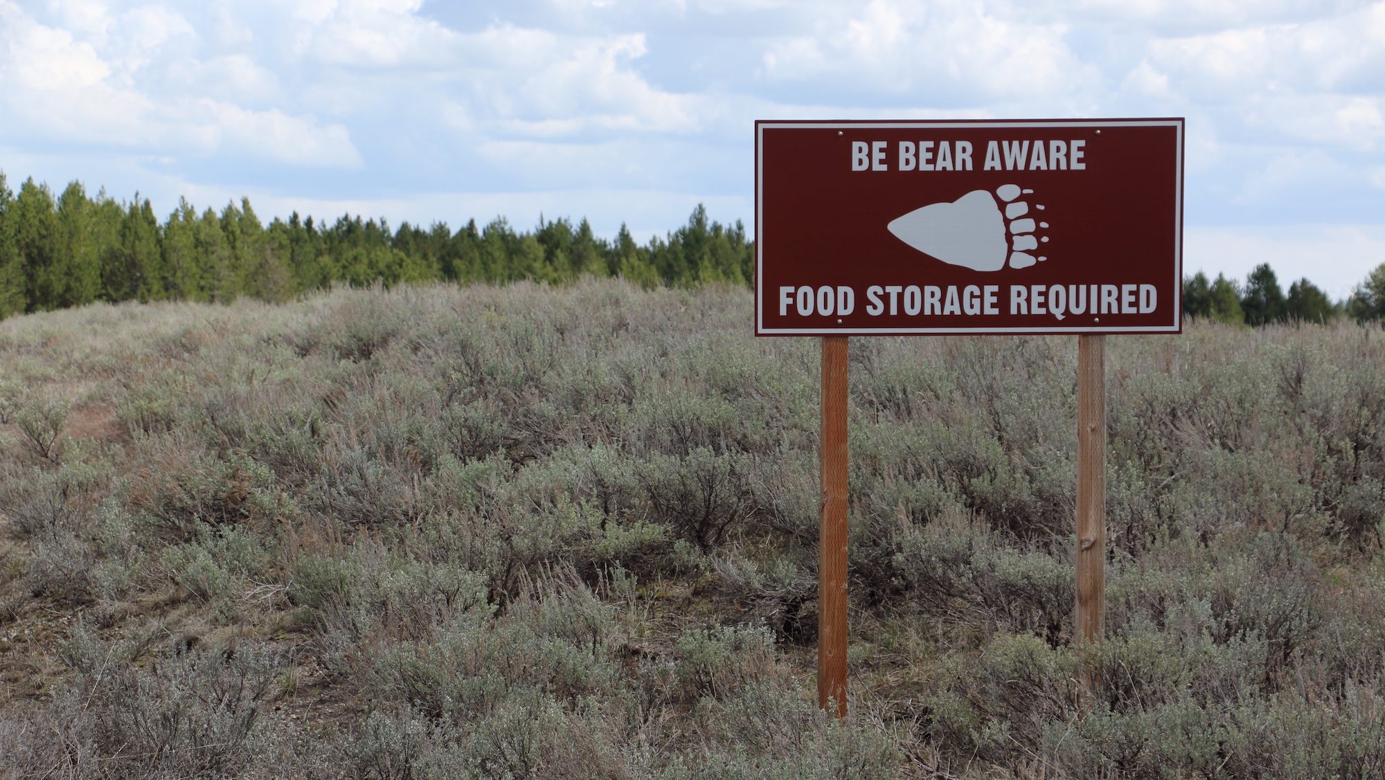 sign warning visitors to lock away food