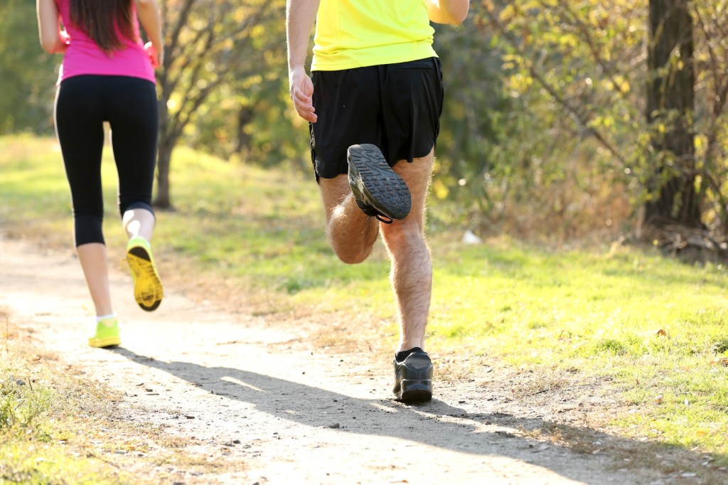 Two people running away from the camera